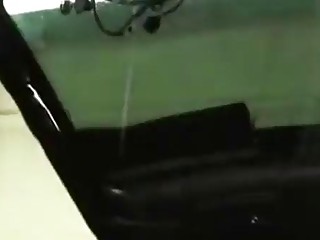 Shemale gets penetrated by her car in the repair shop